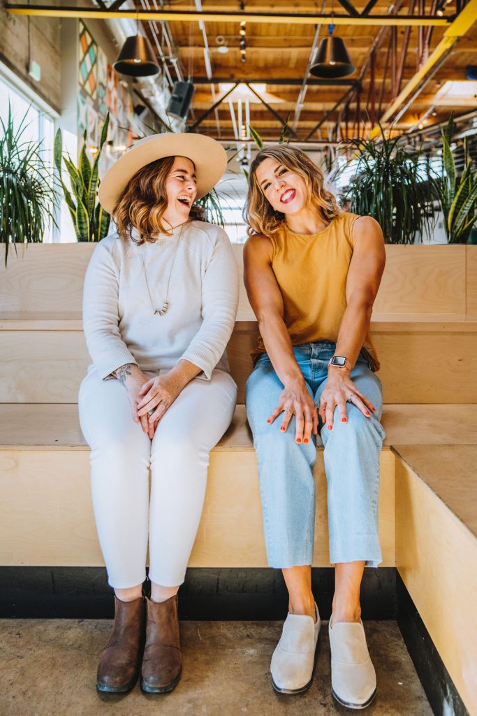 Photo of Joy & Claire sitting on a bench